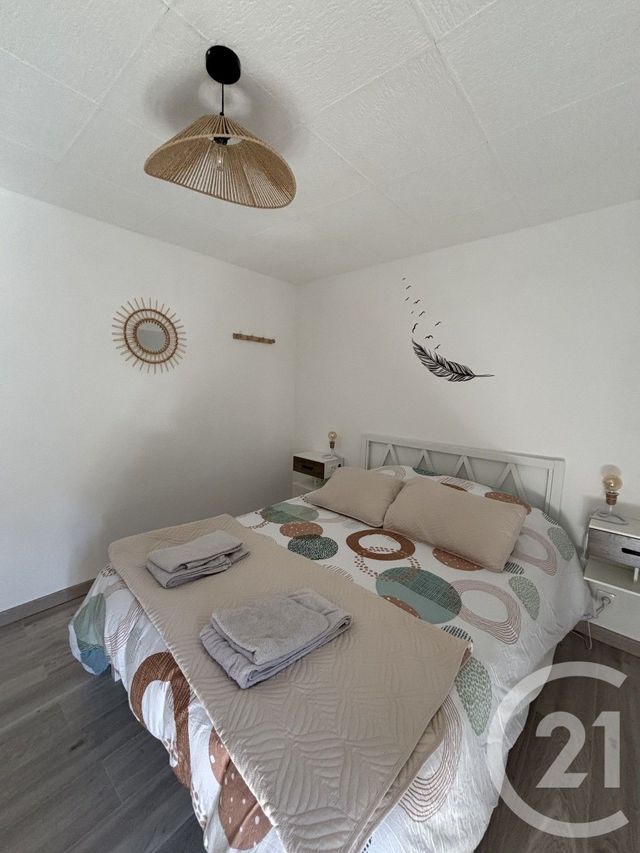 Appartement T3 à louer - 3 pièces - 56.0 m2 - VIC SUR CERE - 15 - AUVERGNE - Century 21 Pradel Immobilier